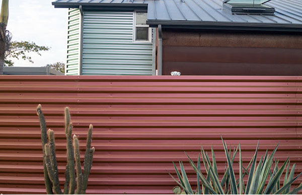 Corrugated metal fence for courtyard